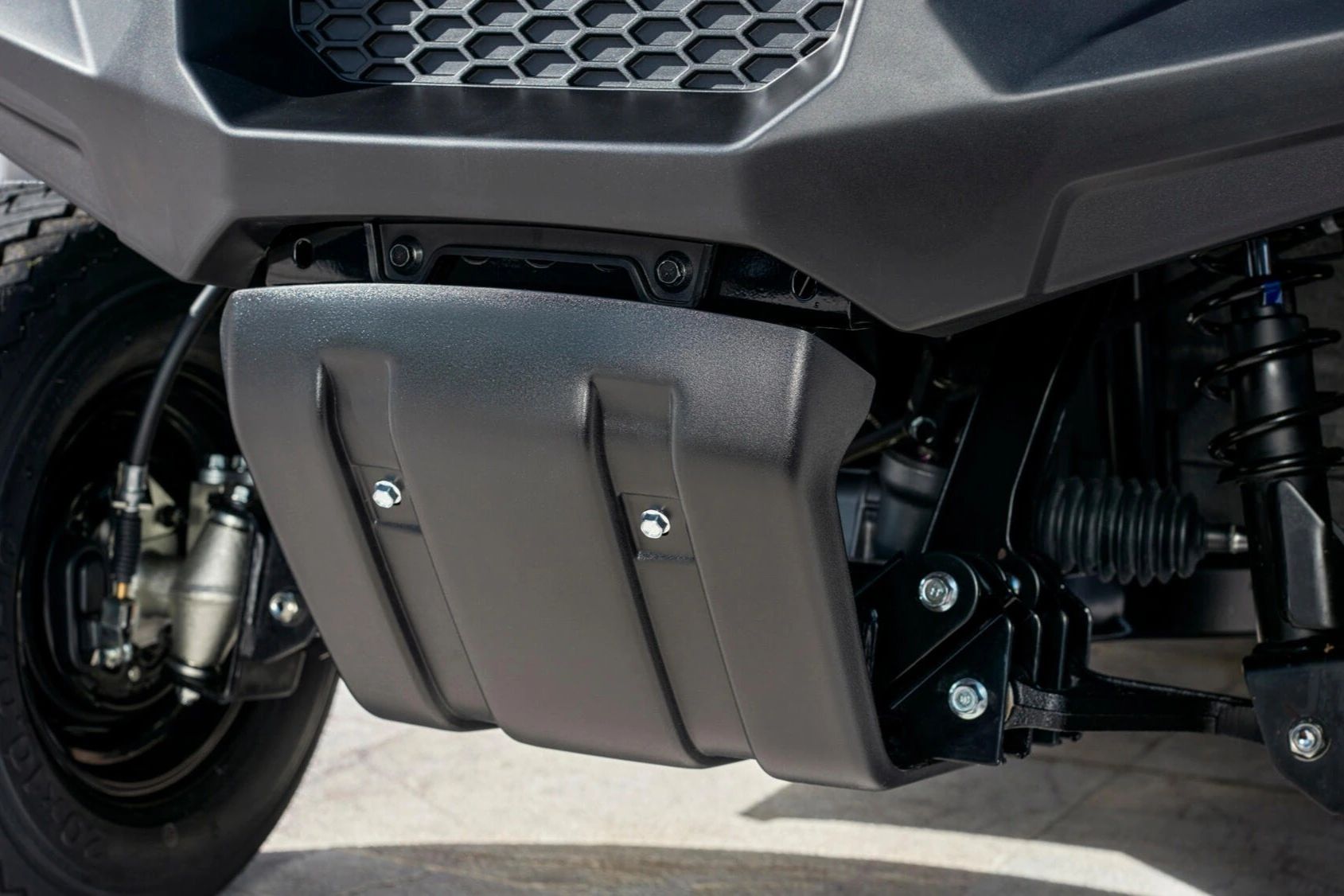 Sabot de protection robuste et suspension stabilisée